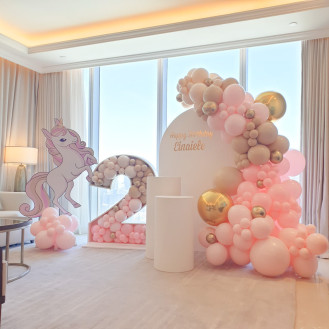 Unicorn Dreams (1.8 m Semi Arch (white ) Personalizattion (3 words max) Number 2 Structure filled with balloons 2 cake stands 1 x unicorn foam board stand )
