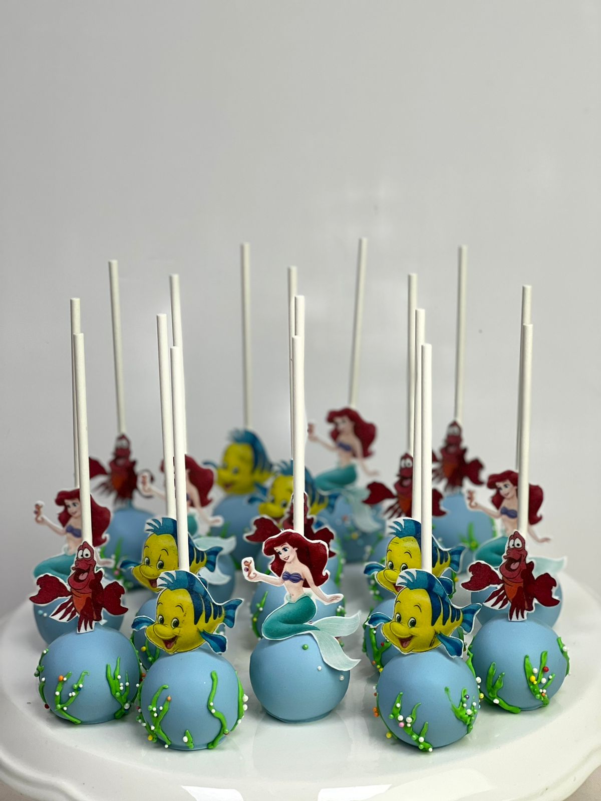 Edible print Of Arial and Flounder  Cakepops  ( Per piece )