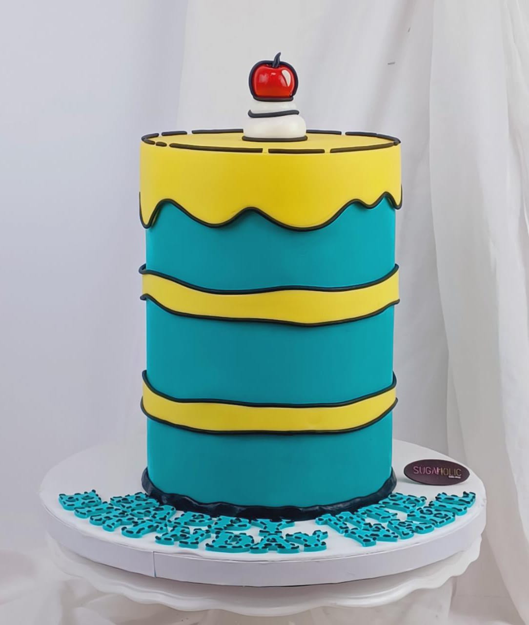 Yellow and Teal Tall Comic Cake