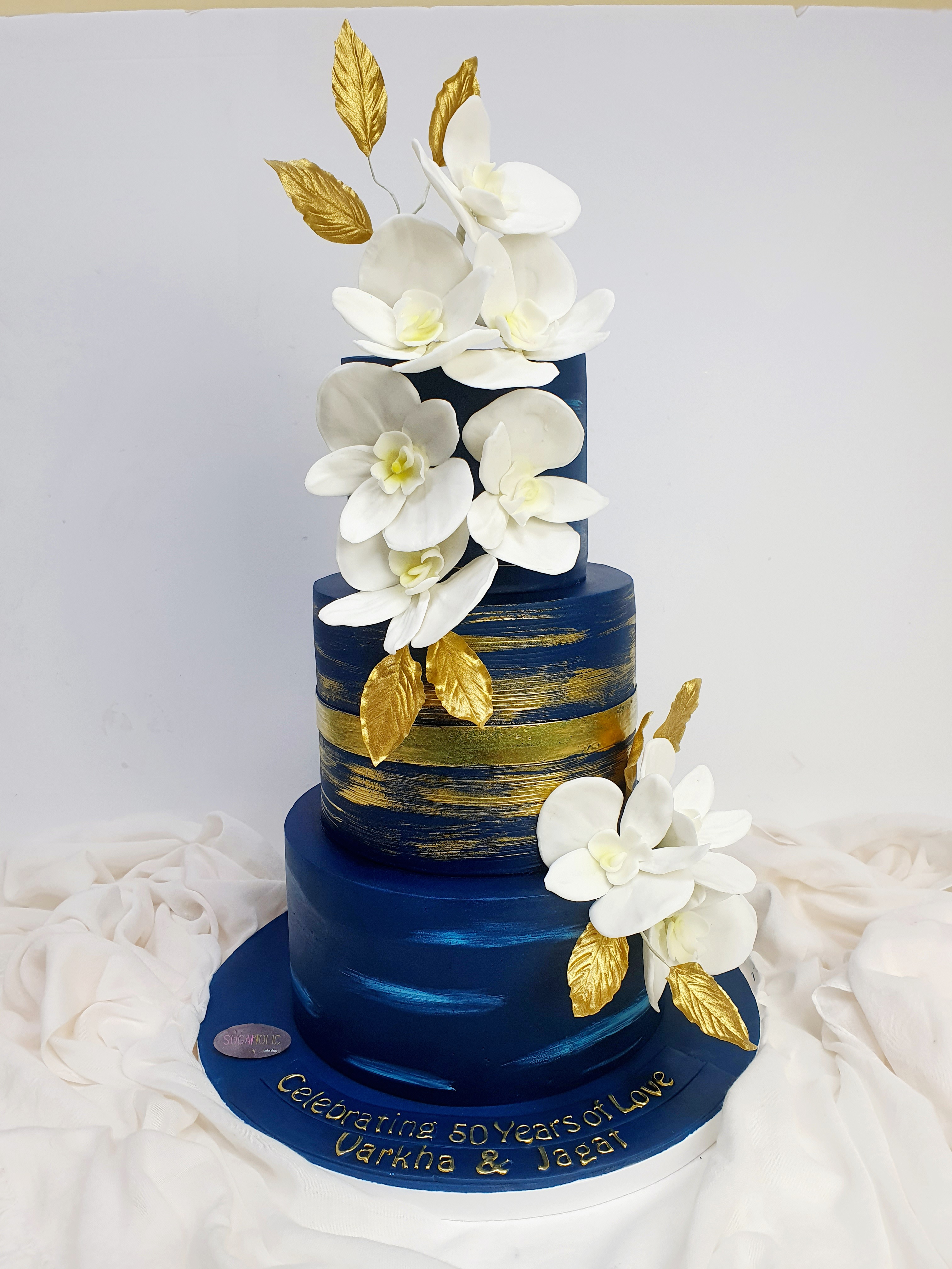 Floral 3 tier blue cake 