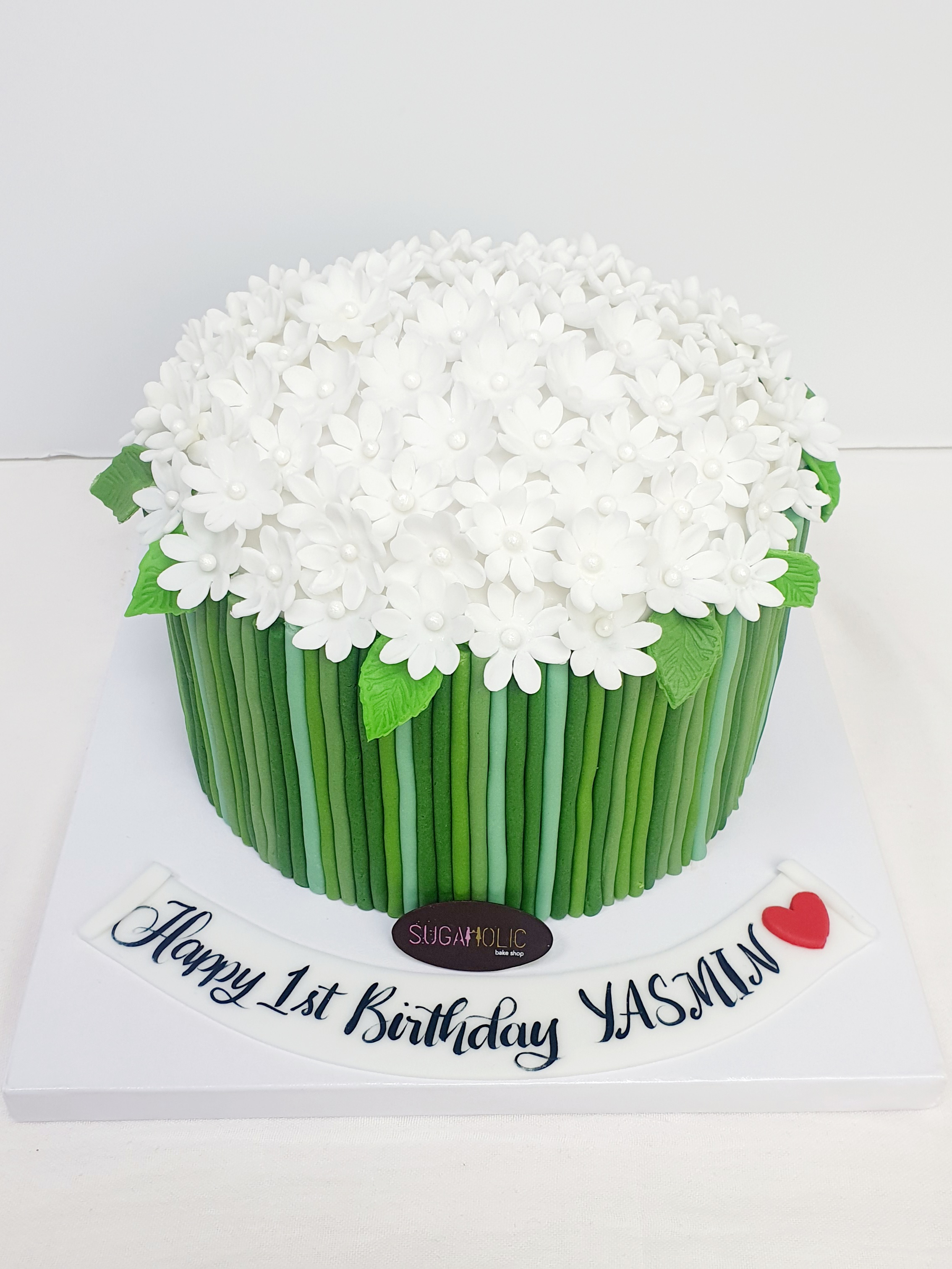 White Flower cake with Green Stems 