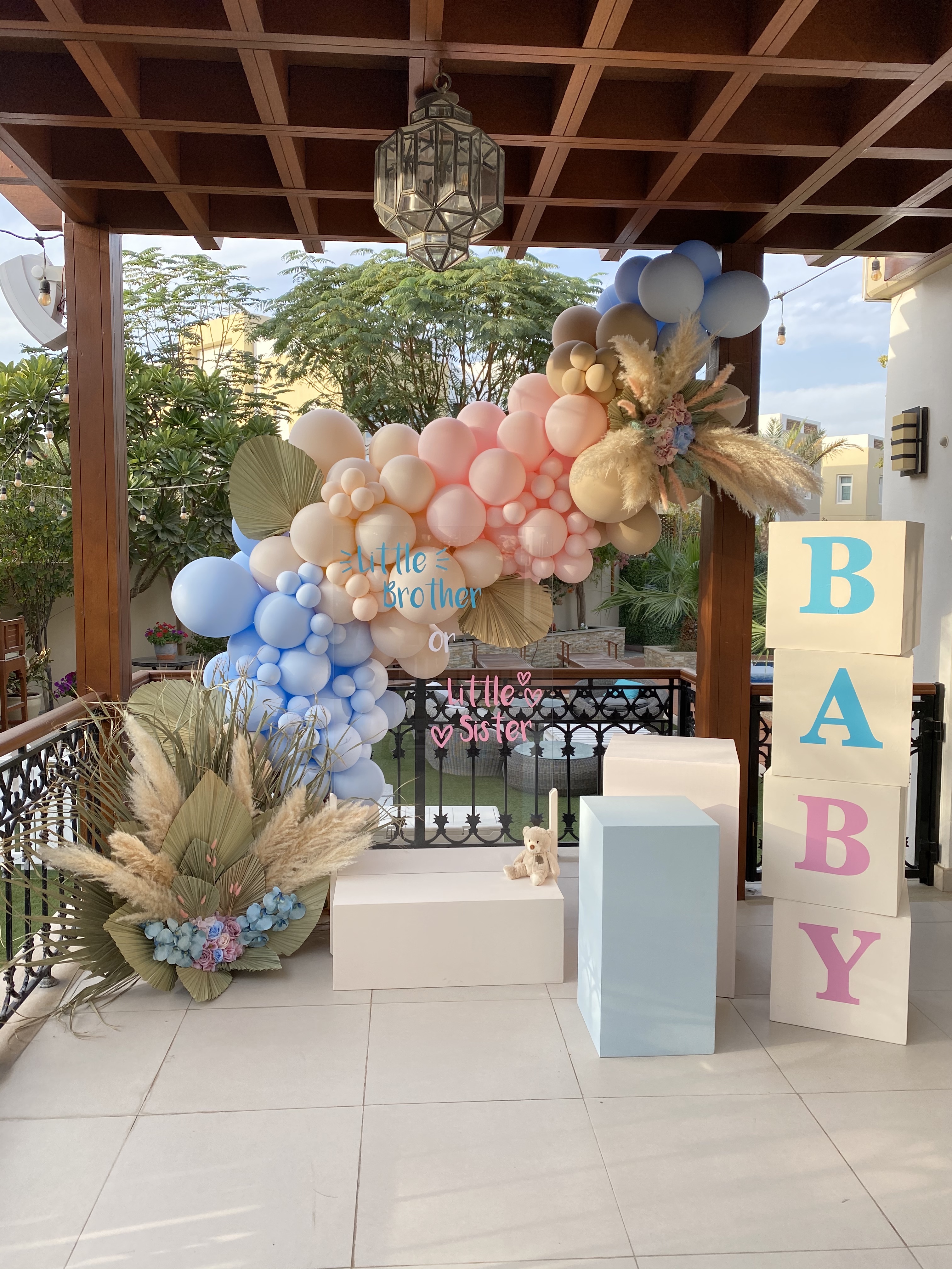 Pampas Gendel Reveal (Ballooon garland 2 x floral arrangements - (one small in corner &amp; one medium on floor - rental only) Personalization 2 cake stands &amp; 1 acrylic stand Baby blocks)