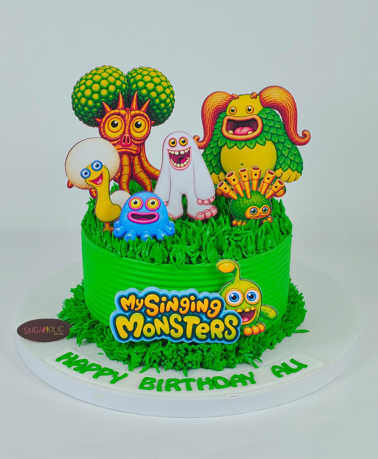 Colourful Singing Monsters Buttercream Cake