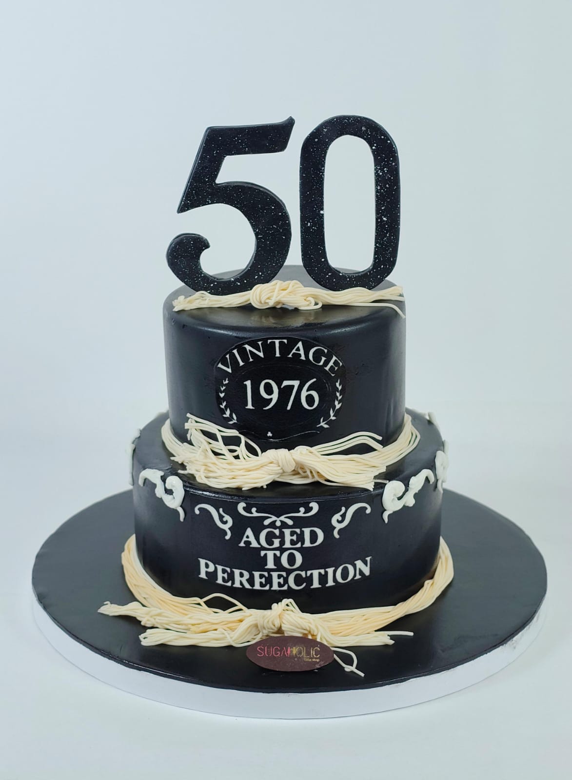 Vintage Black and Ivory Two Tier Fondant Cake