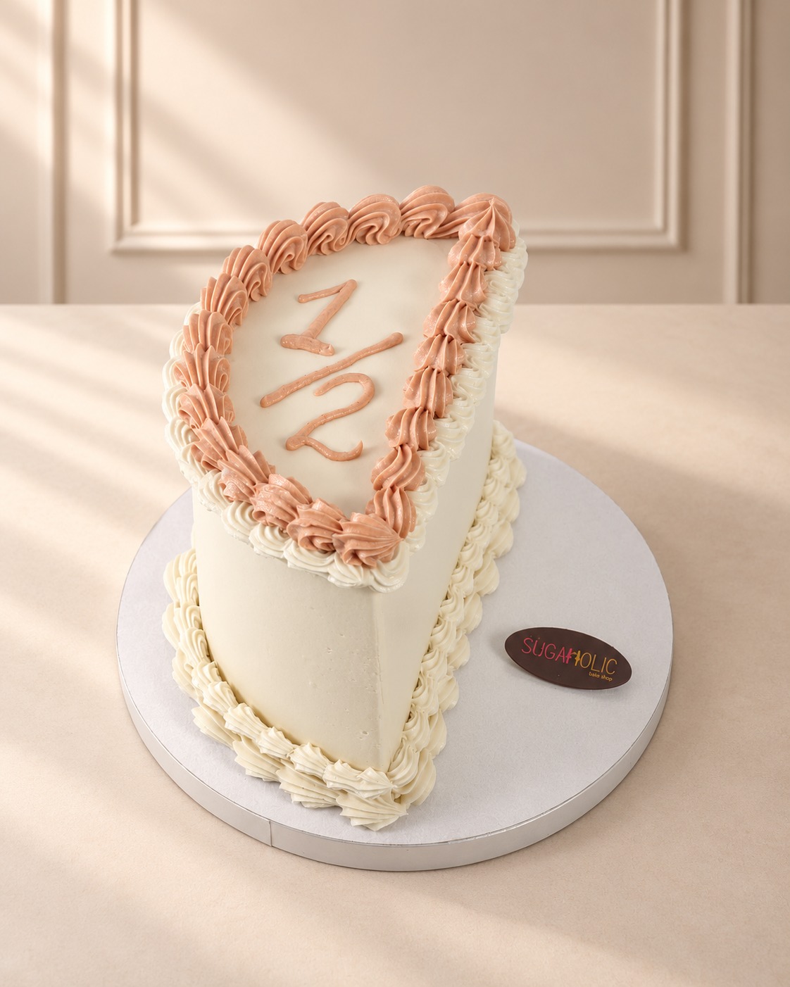Half Heart Cake with Rose Gold Piping
